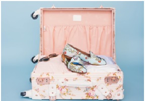 Sandwich-Between-Your-Clothes- Top 5 Tips To Carry A Wine Bottle In Suitcase